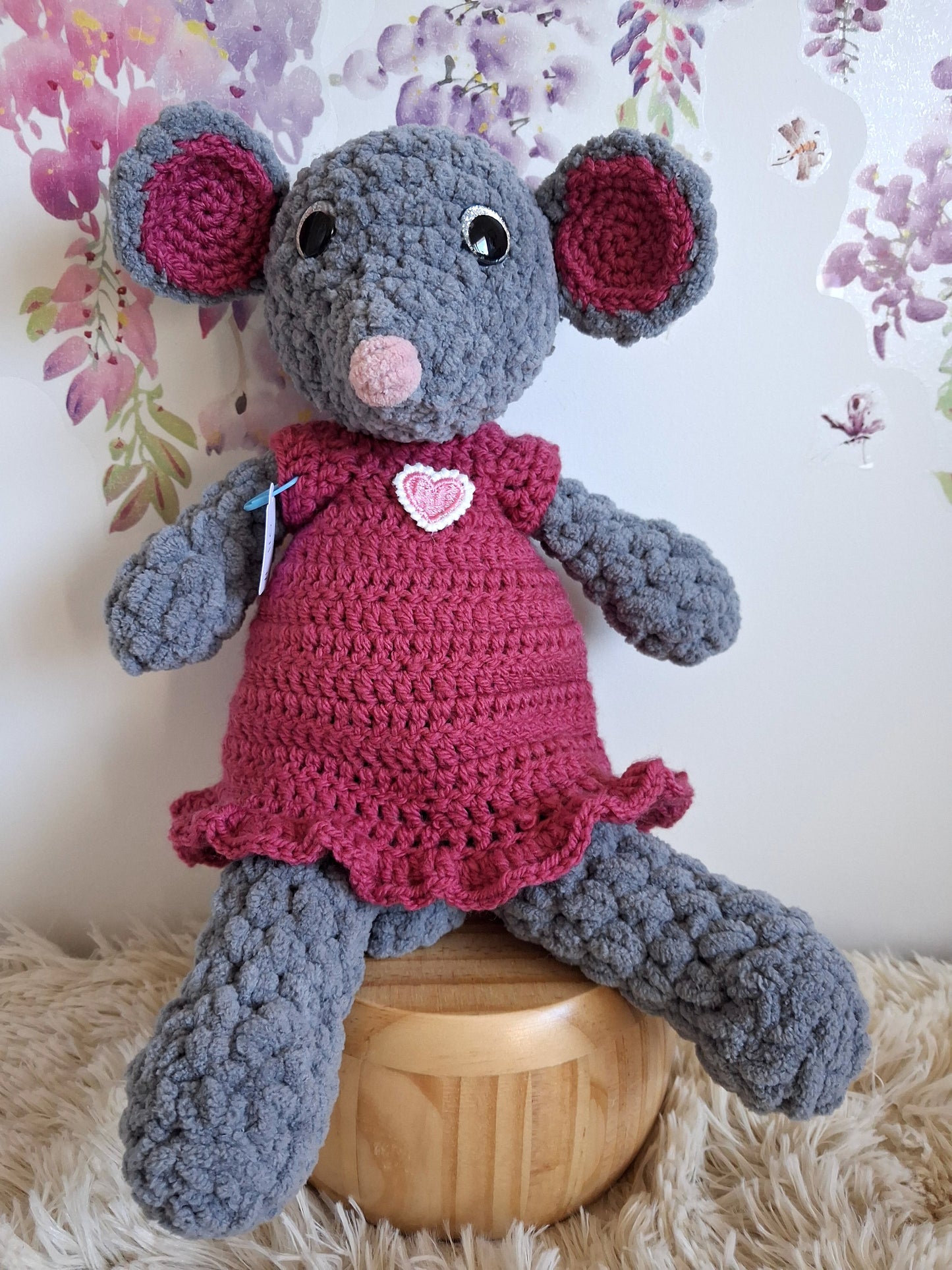 Sandra the dress wearing mouse.