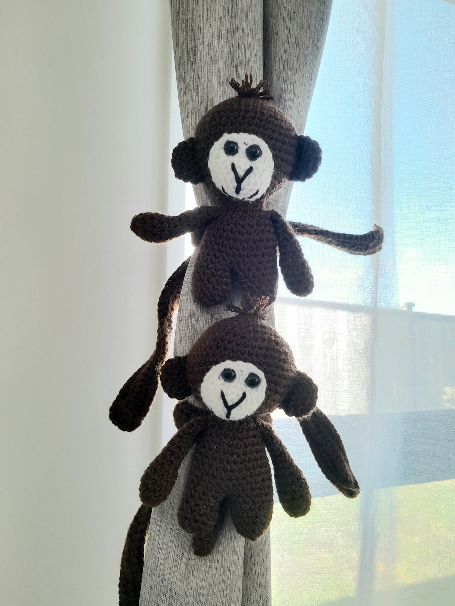 Monkey curtain tiebacks