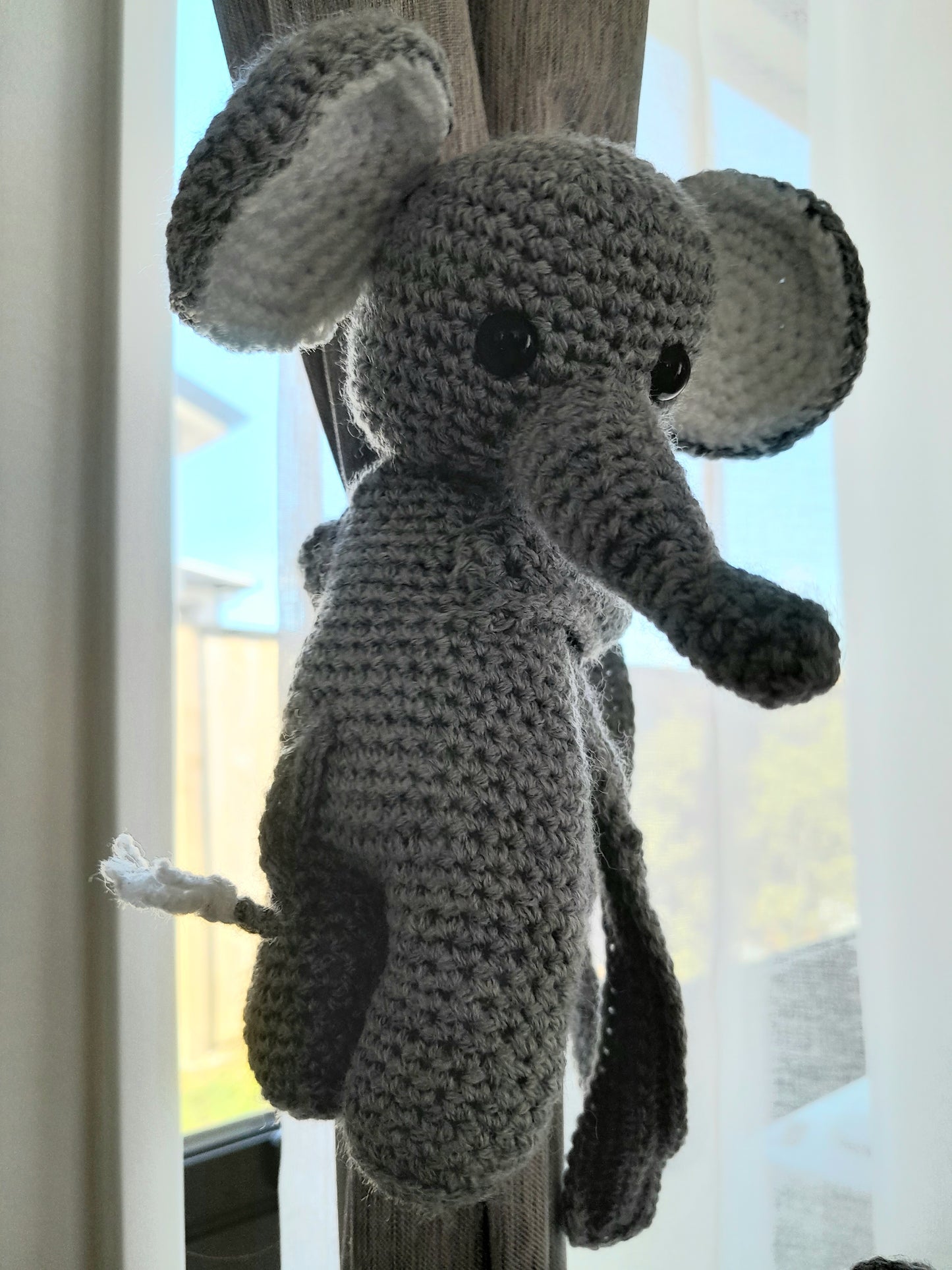 Elephant curtain tiebacks